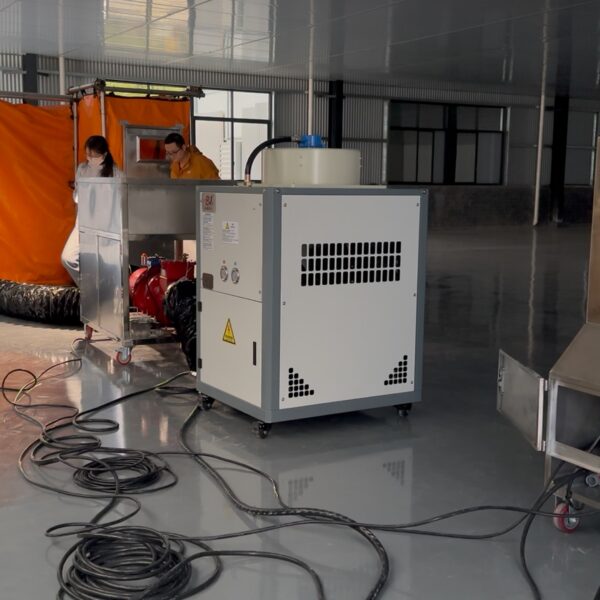 Industrial welding habitat system setup in a factory workshop
